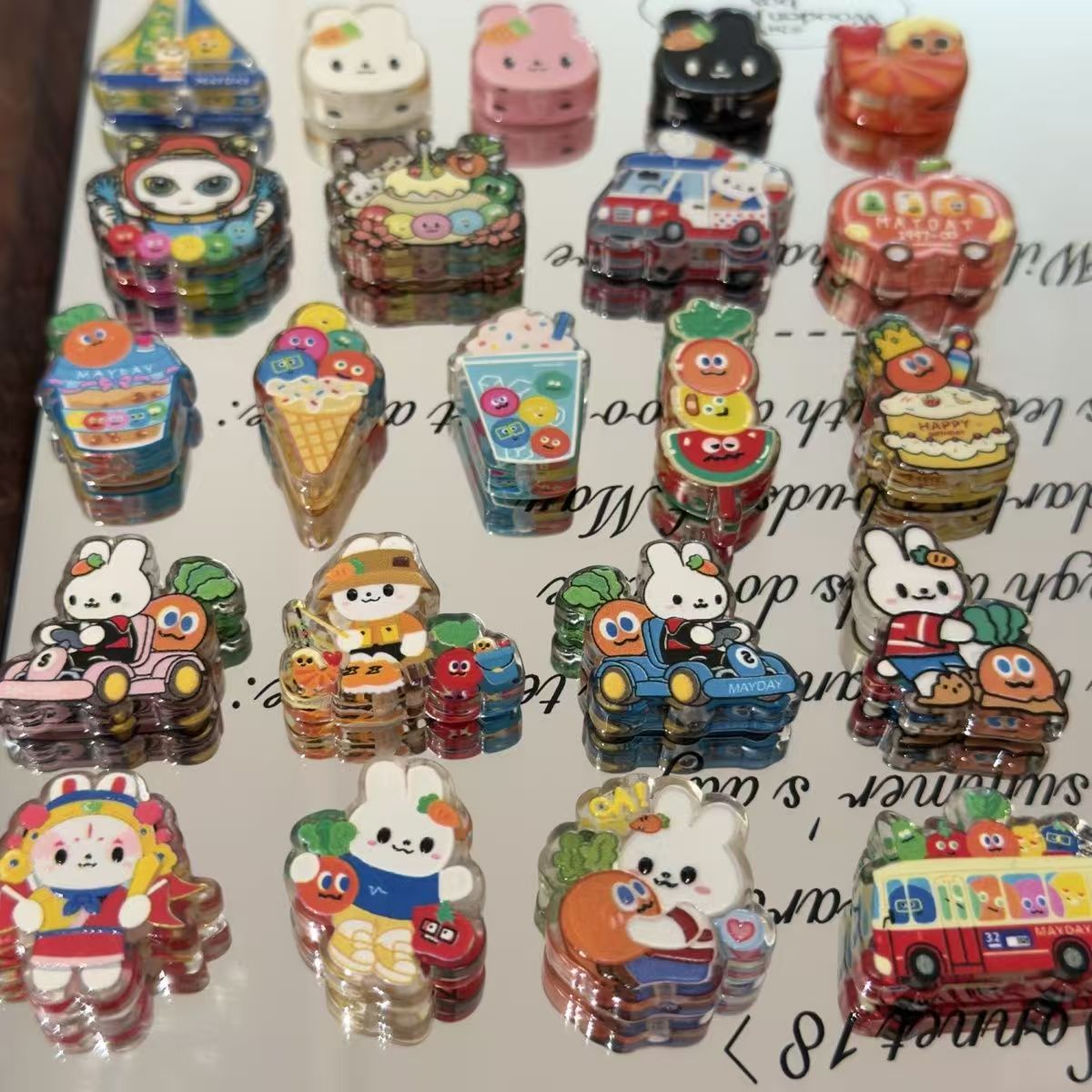 Double-sided embossed painted acrylic beads